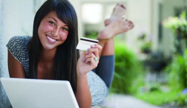 Young girl with credit card