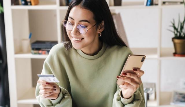 Woman looking at card