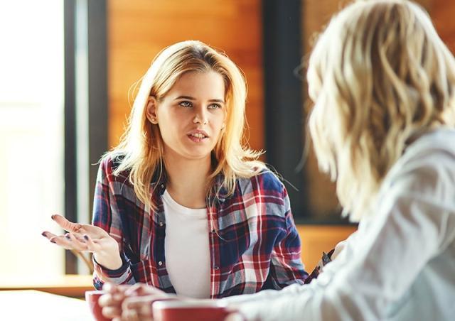 Friends talking over coffee