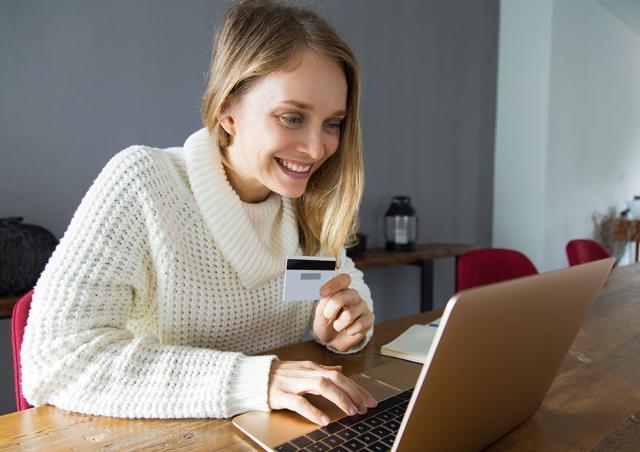 woman looking at computer