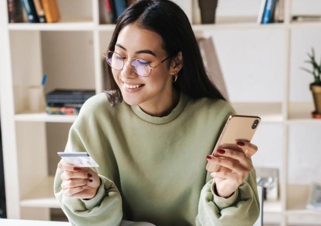 Woman looking at card